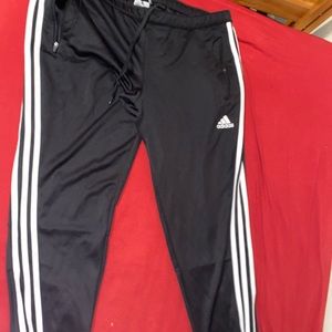 Worn Nike track pants